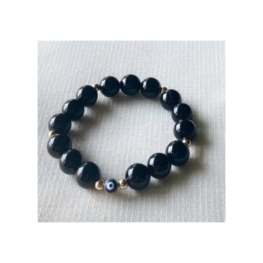 Obsidian bracelet with evil eye charm