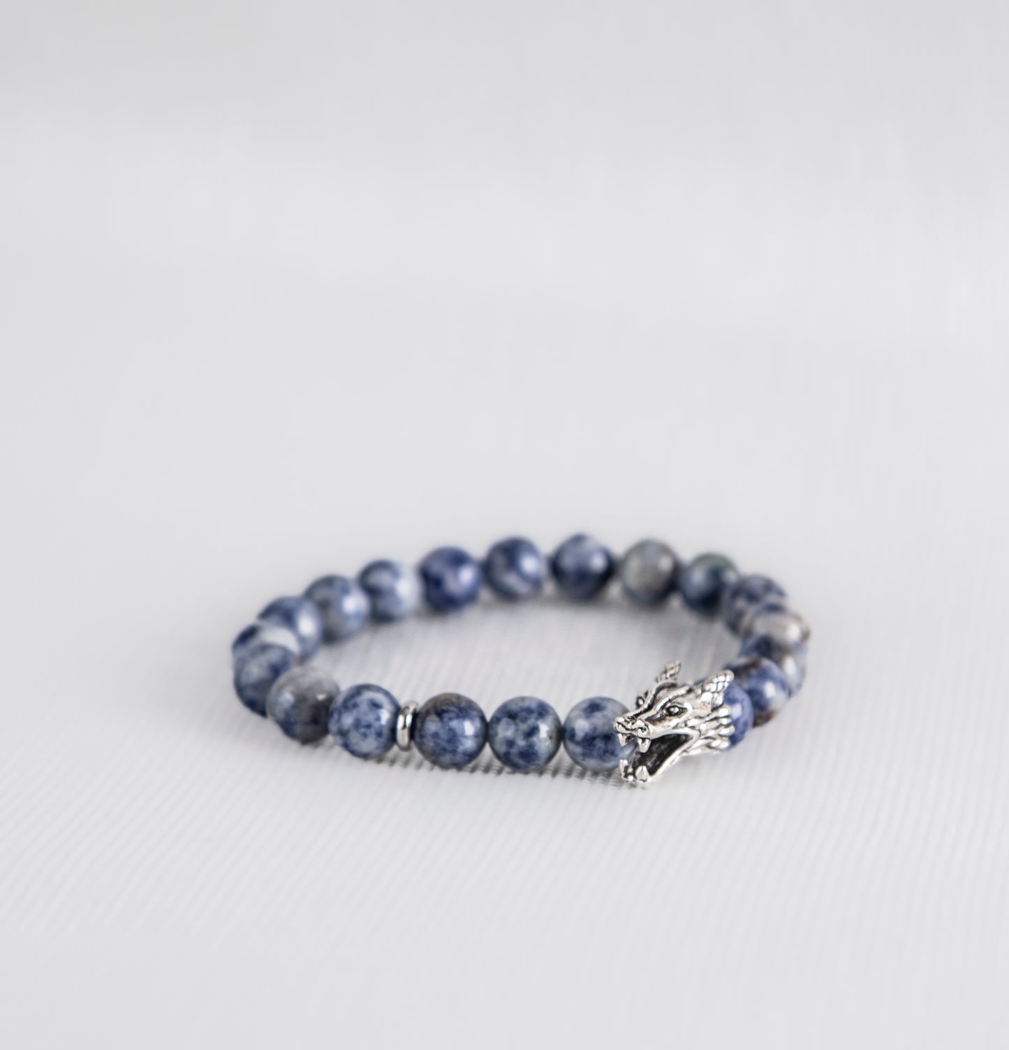 Sodalite bracelet with silver dragon charm