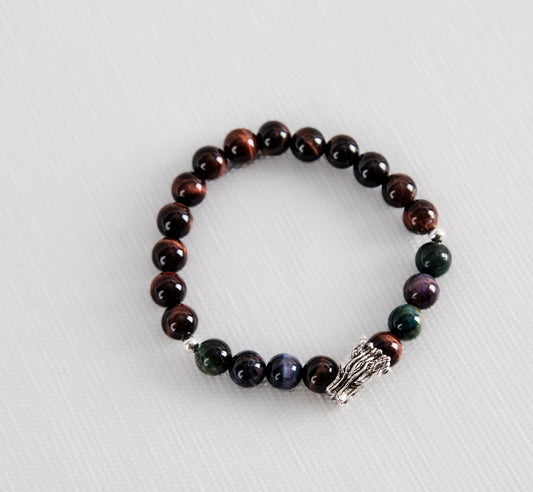 Multicoloured tiger's eye with silver dragon charm