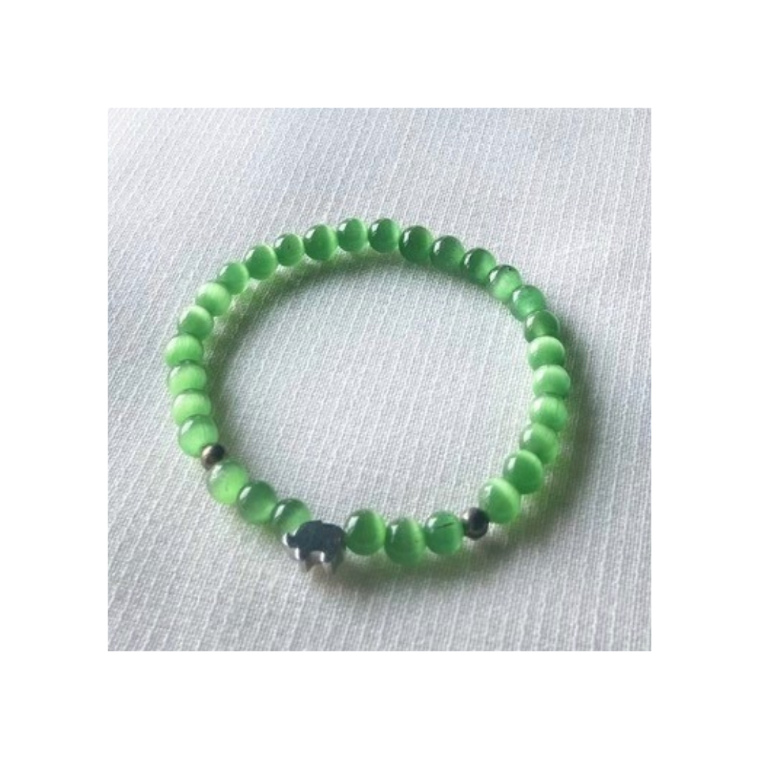 Green cat's eye with silver elephant charm