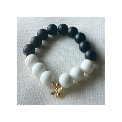 Onyx and matte howlite bracelet with gold bee charm