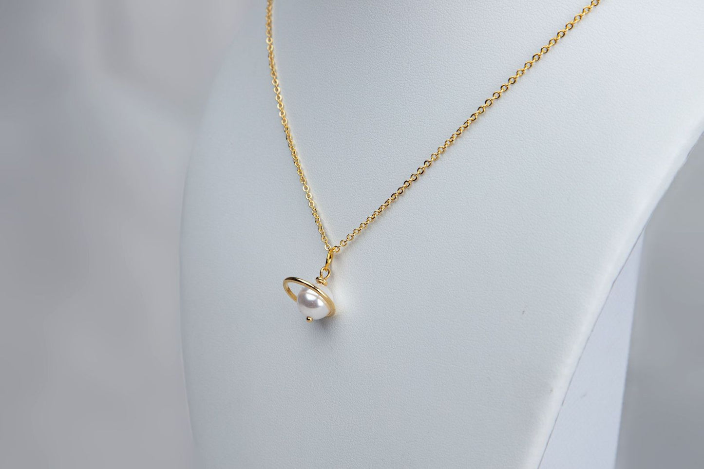 Pearl saturn necklace